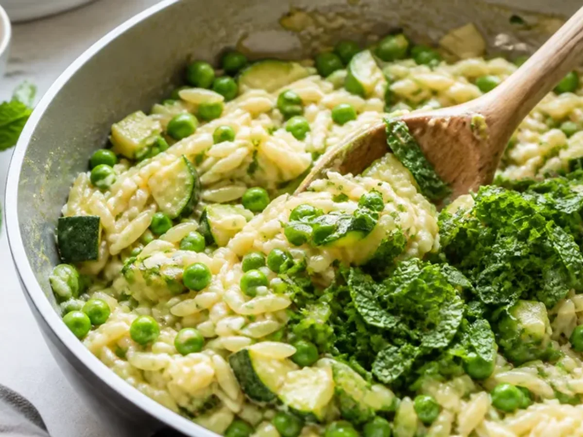 Fold in peas and mint